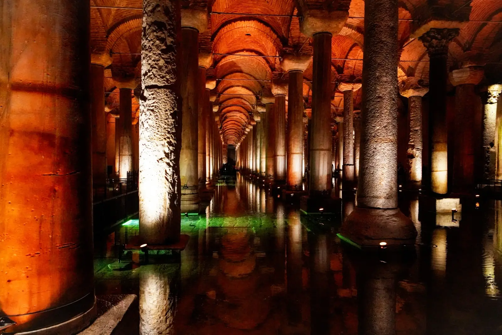 Lit columns of the Basilica Cistern reflected in the water